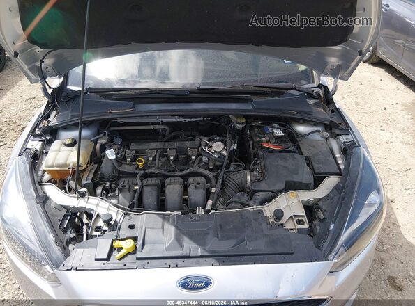 1FADP3F22GL383204 2016 FORD FOCUS Silver Vista trasera