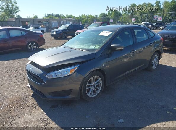 1FADP3F23HL278642 2017 FORD FOCUS Gray Vista tres cuartos delantera izquierda