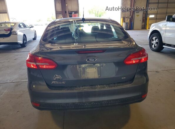 1FADP3F24JL269809 2018 FORD FOCUS Gray Rear view