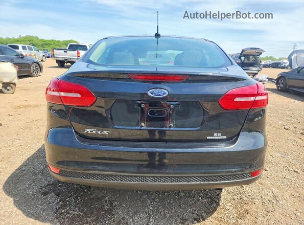 1FADP3F25GL390292 2016 FORD FOCUS Black უკანა ხედი