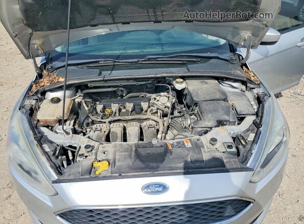 1FADP3F25JL272301 2018 FORD FOCUS Silver Вид задньої частини салону