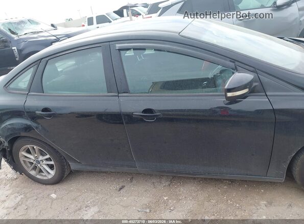 1FADP3F26GL250736 2016 FORD FOCUS Black Rear interior view