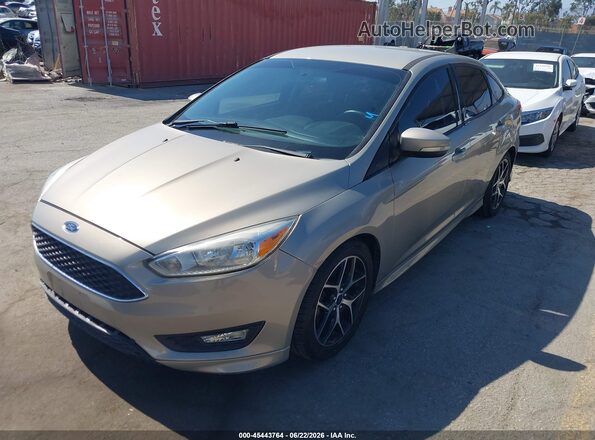 1FADP3F26GL315407 2016 FORD FOCUS Gold Vista tres cuartos delantera izquierda