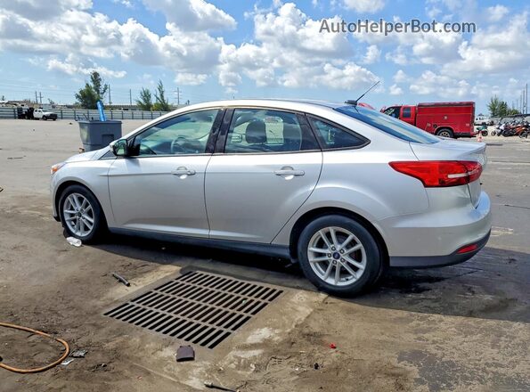 1FADP3F26HL337845 2017 FORD FOCUS Silver Trasero izquierdo