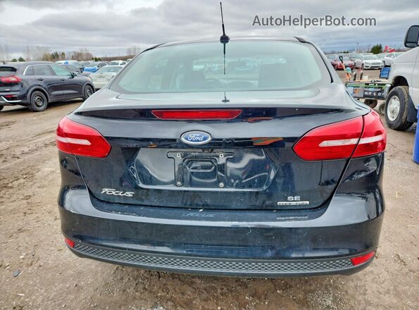 1FADP3F27GL370285 2016 FORD FOCUS Черный Вид сзади
