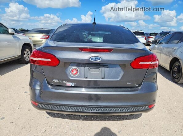 1FADP3F27HL282161 2017 FORD FOCUS Gray Rear view