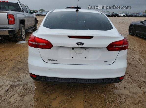 1FADP3F27HL300674 2017 FORD FOCUS Белый Вид сзади
