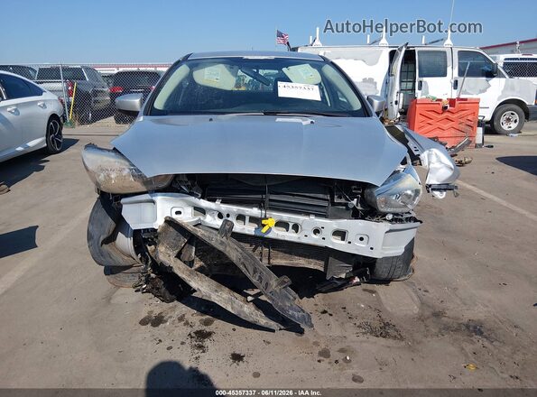 1FADP3F27JL330540 2018 FORD FOCUS Silver Rear interior view