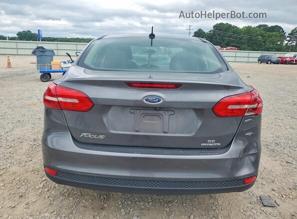 1FADP3F28GL358940 2016 FORD FOCUS Black Widok z tyłu