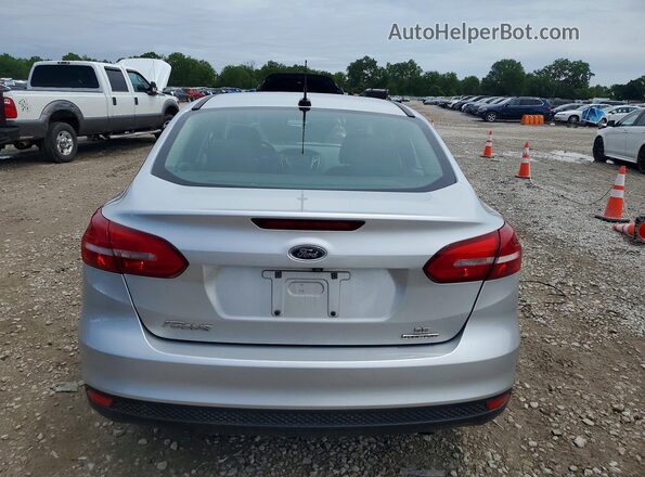 1FADP3F28GL398211 2016 FORD FOCUS Silver Rear view