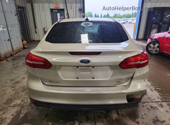1FADP3F28HL203161 2017 FORD FOCUS Желто-коричневый Вид сзади