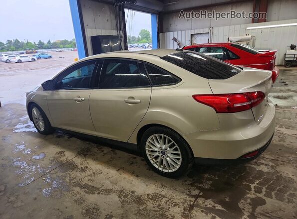1FADP3F28HL203161 2017 FORD FOCUS Желто-коричневый Задняя левая четверть