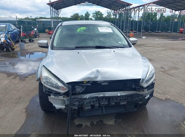 1FADP3F28HL251047 2017 FORD FOCUS Silver Սալոնի հետևի տեսք