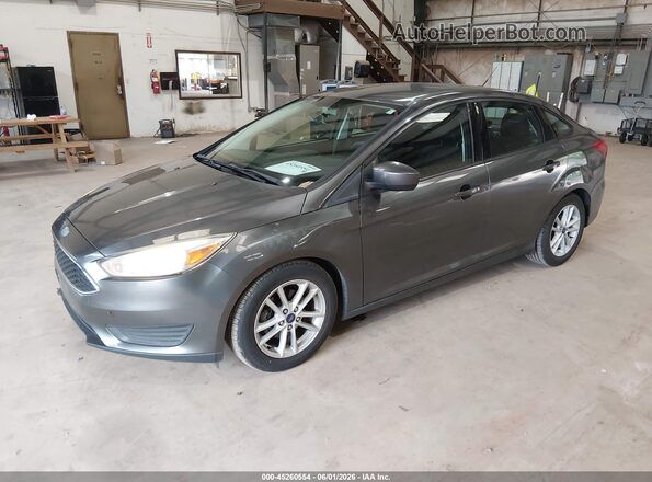 1FADP3F28JL328280 2018 FORD FOCUS Gray Vista tres cuartos delantera izquierda