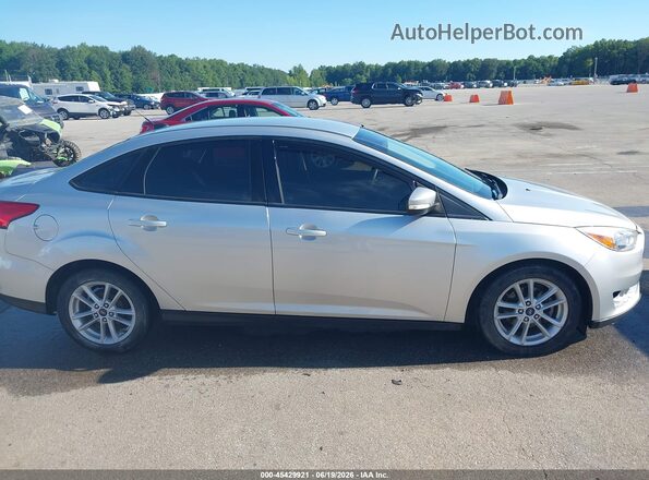 1FADP3F2XHL264298 2017 FORD FOCUS Silver Rear interior view