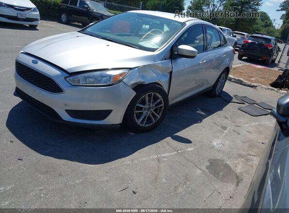 1FADP3FE0JL283975 2018 FORD FOCUS Silver Առջևի ձախ երեք քառորդ տեսարան