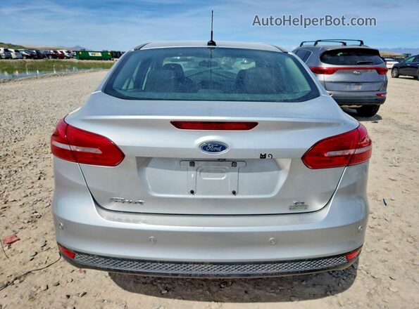 1FADP3FE1GL405302 2016 FORD FOCUS Silver Rear view