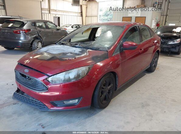 1FADP3FE7GL219263 2016 FORD FOCUS Burgundy Vista tres cuartos delantera izquierda