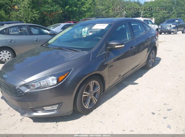 1FADP3FE7JL254201 2018 FORD FOCUS Gray Vista tres cuartos delantera izquierda