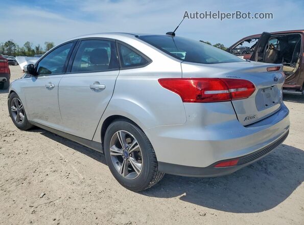 1FADP3FE9JL303169 2018 FORD FOCUS Silver Trasero izquierdo