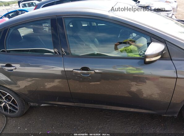 1FADP3FEXHL229769 2017 FORD FOCUS Серый Вид задней части салона