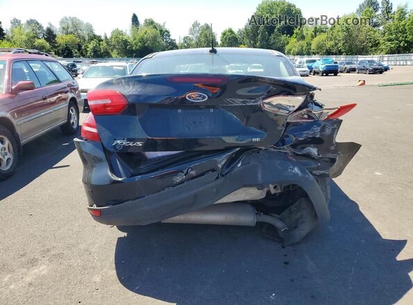1FADP3H22HL324250 2017 FORD FOCUS Black Rear view