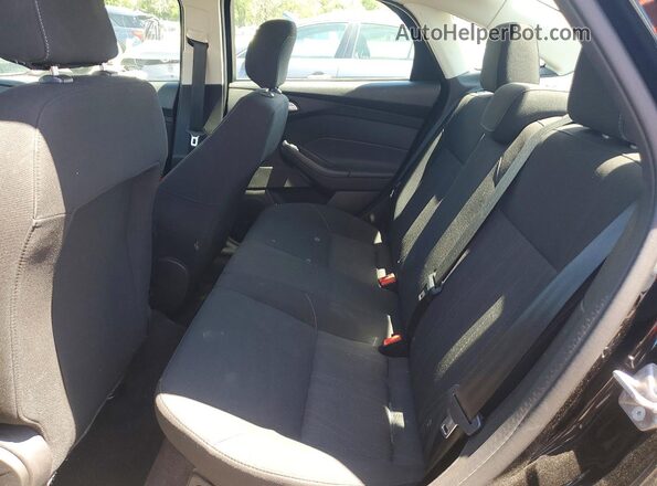 1FADP3H24JL259889 2018 FORD FOCUS Black Rear seats view