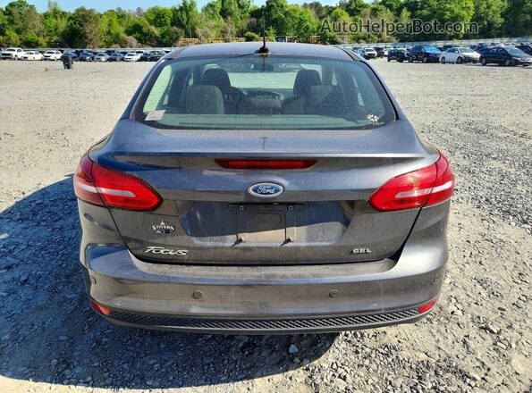 1FADP3H25HL238107 2017 FORD FOCUS Gray Vista trasera