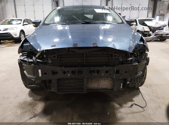 1FADP3H28JL319074 2018 FORD FOCUS Синий Вид задней части салона
