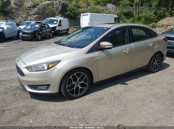 1FADP3H29HL238417 2017 FORD FOCUS Gold Vista tres cuartos delantera izquierda
