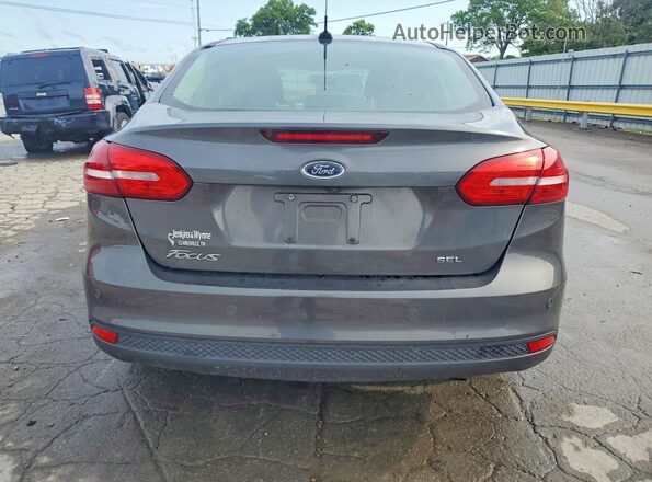 1FADP3H2XJL307864 2018 FORD FOCUS Gray 