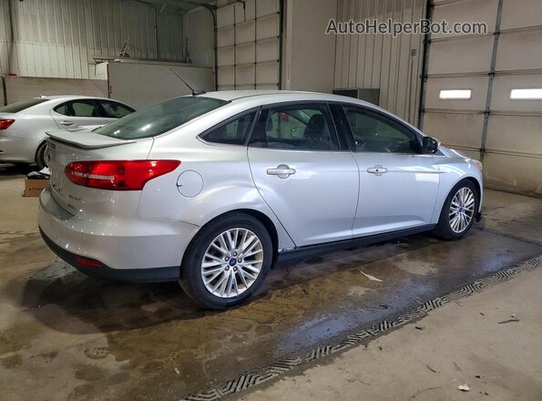 1FADP3J21GL243247 2016 FORD FOCUS Серебряный 