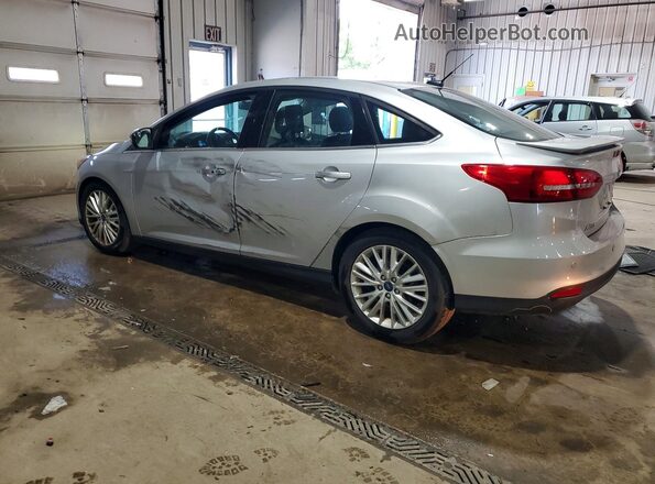 1FADP3J21GL243247 2016 FORD FOCUS Серебряный 