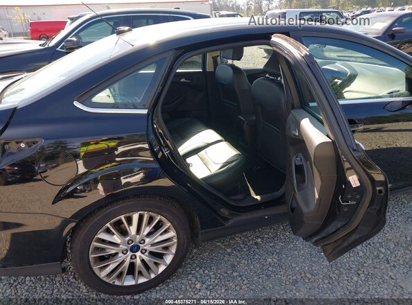 1FADP3J2XHL272621 2017 FORD FOCUS Black Vista de la etiqueta del VIN