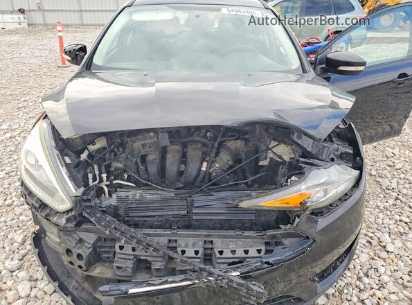 1FADP3K27GL297974 2016 FORD FOCUS Black Вид задньої частини салону