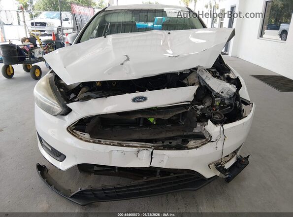 1FADP3K29GL239574 2016 FORD FOCUS White Вид задньої частини салону