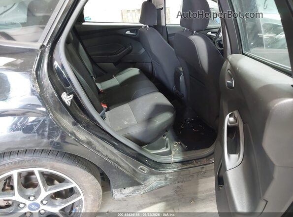 1FADP3K29GL355468 2016 FORD FOCUS Black Widok naklejki z numerem VIN