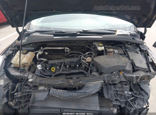 1FADP3K29JL227612 2018 FORD FOCUS Black Rear view