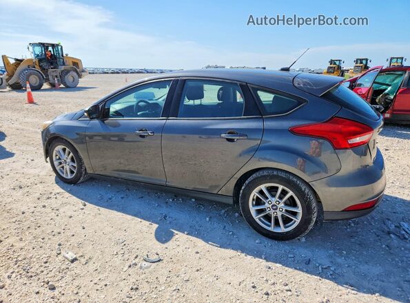 1FADP3K2XHL216192 2017 FORD FOCUS Charcoal Trasero izquierdo