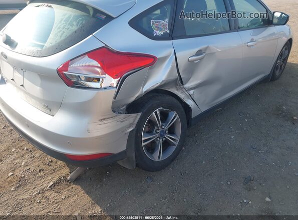 1FADP3KEXGL236631 2016 FORD FOCUS Серебряный Вид спереди