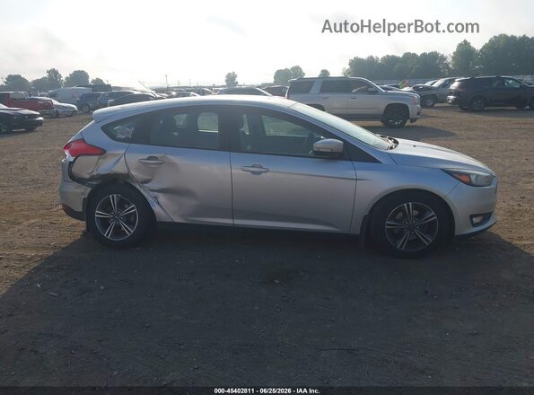 1FADP3KEXGL236631 2016 FORD FOCUS Серебряный Вид задней части салона