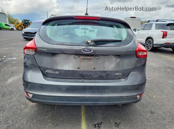1FADP3M23JL261946 2018 FORD FOCUS Gray Rear view