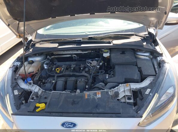 1FADP3M24JL202999 2018 FORD FOCUS Silver Rear view