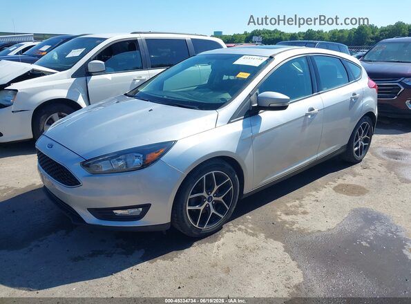 1FADP3M24JL202999 2018 FORD FOCUS Silver Front left