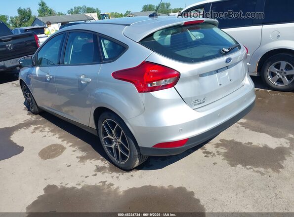 1FADP3M24JL202999 2018 FORD FOCUS Silver Rear left