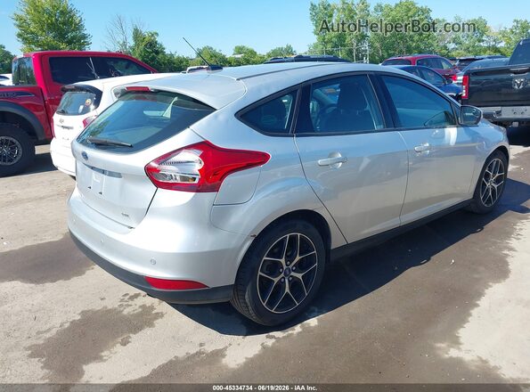 1FADP3M24JL202999 2018 FORD FOCUS Silver Rear right
