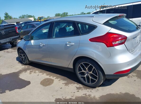 1FADP3M24JL202999 2018 FORD FOCUS Silver 360 interior view