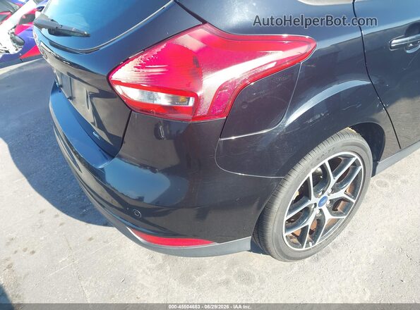 1FADP3M28HL225504 2017 FORD FOCUS Black Front view