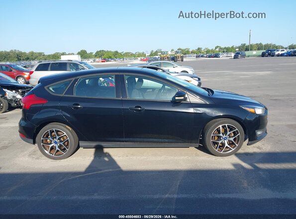 1FADP3M28HL225504 2017 FORD FOCUS Black Rear interior view