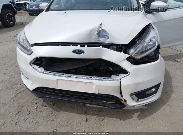 1FADP3N20HL291477 2017 FORD FOCUS White Вид спереду